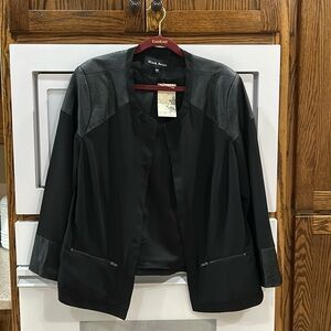 NWT Black jacket w-faux leather contrast. Size 1X. See pictures- 1 tiny flaw.